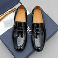 Dior Men's Black Embossed Buckle Loafers